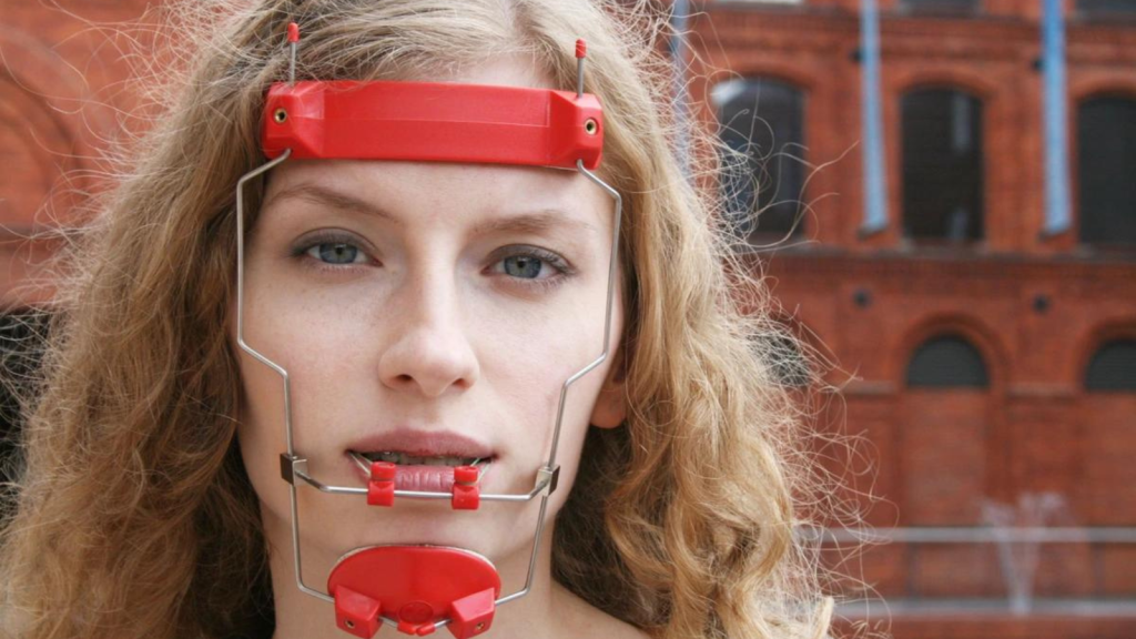 Woman wearing orthodontic headgear