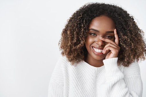 Image of a young woman with a beautiful smile