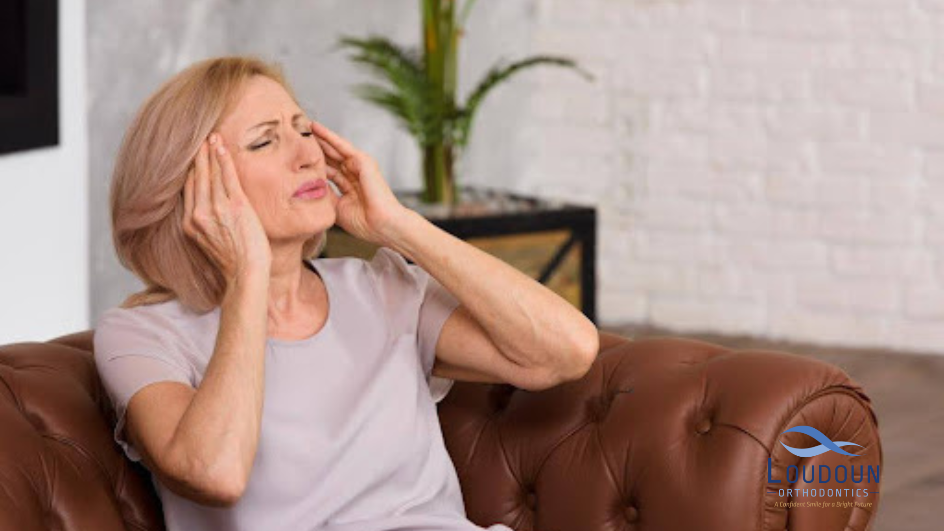 Woman with headaches caused by wisdom tooth pain