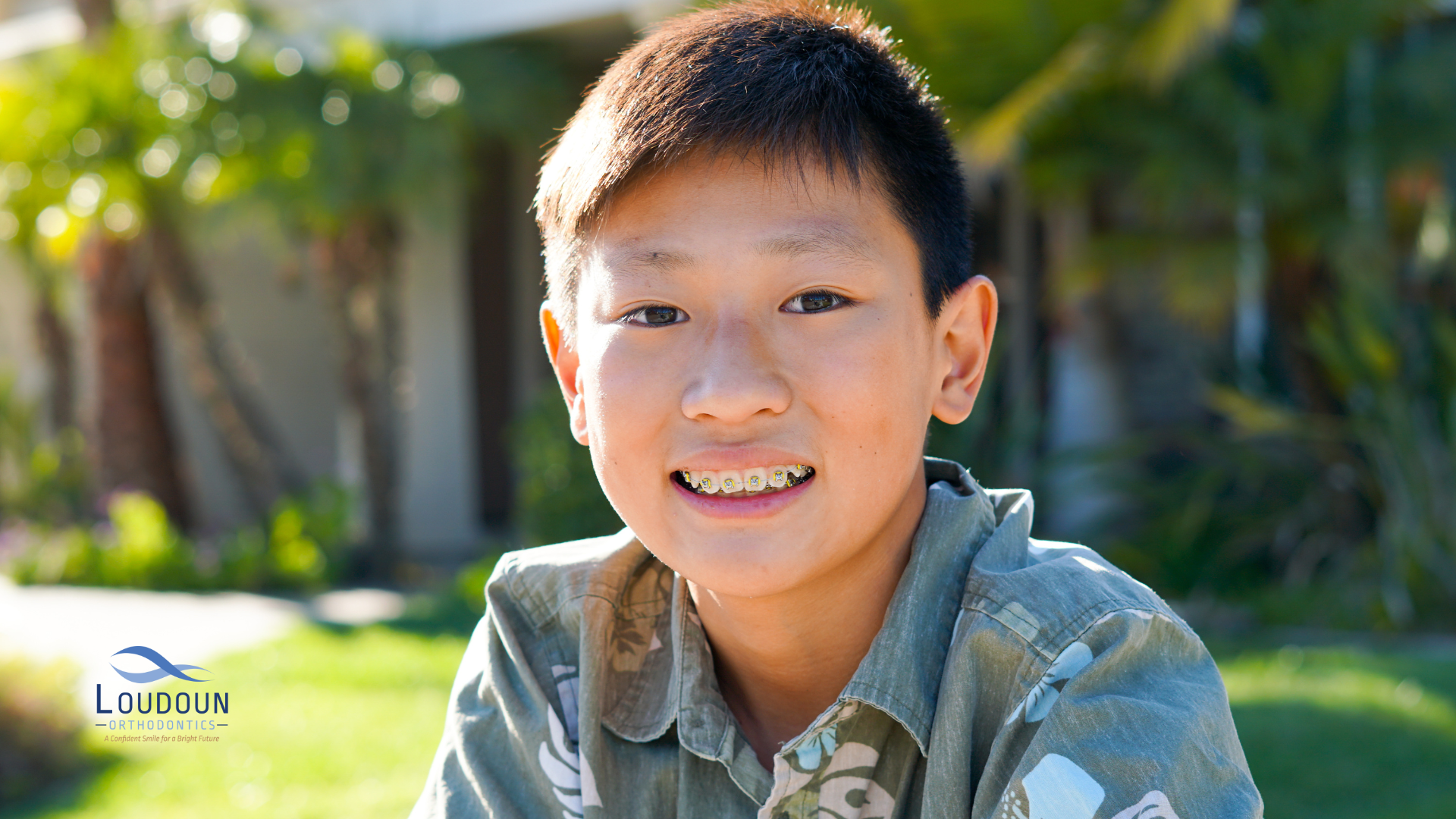 young kid smiling with braces